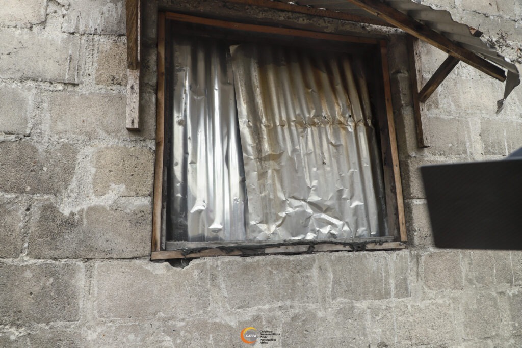 Scorch marks on a window at 26 Opu Dah Compound following a fire linked by residents to gas escaping from a nearby borehole